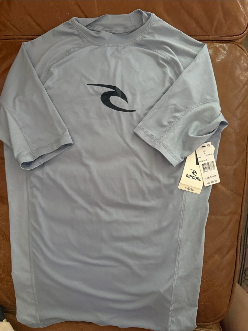 Rip Curl Light gray/blueMen's small Short-Sleeve Rash Guard with Black Logo. NWT